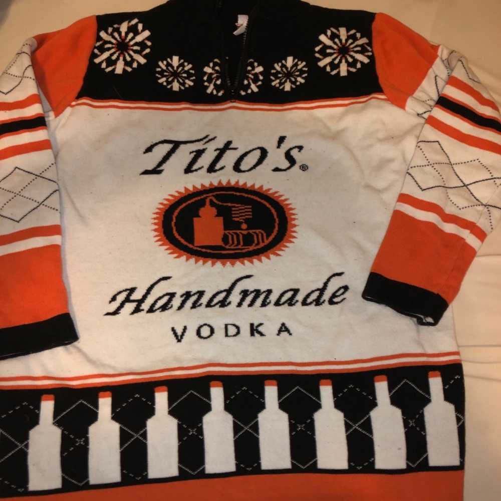 Tito’s holiday sweater and overnight kit